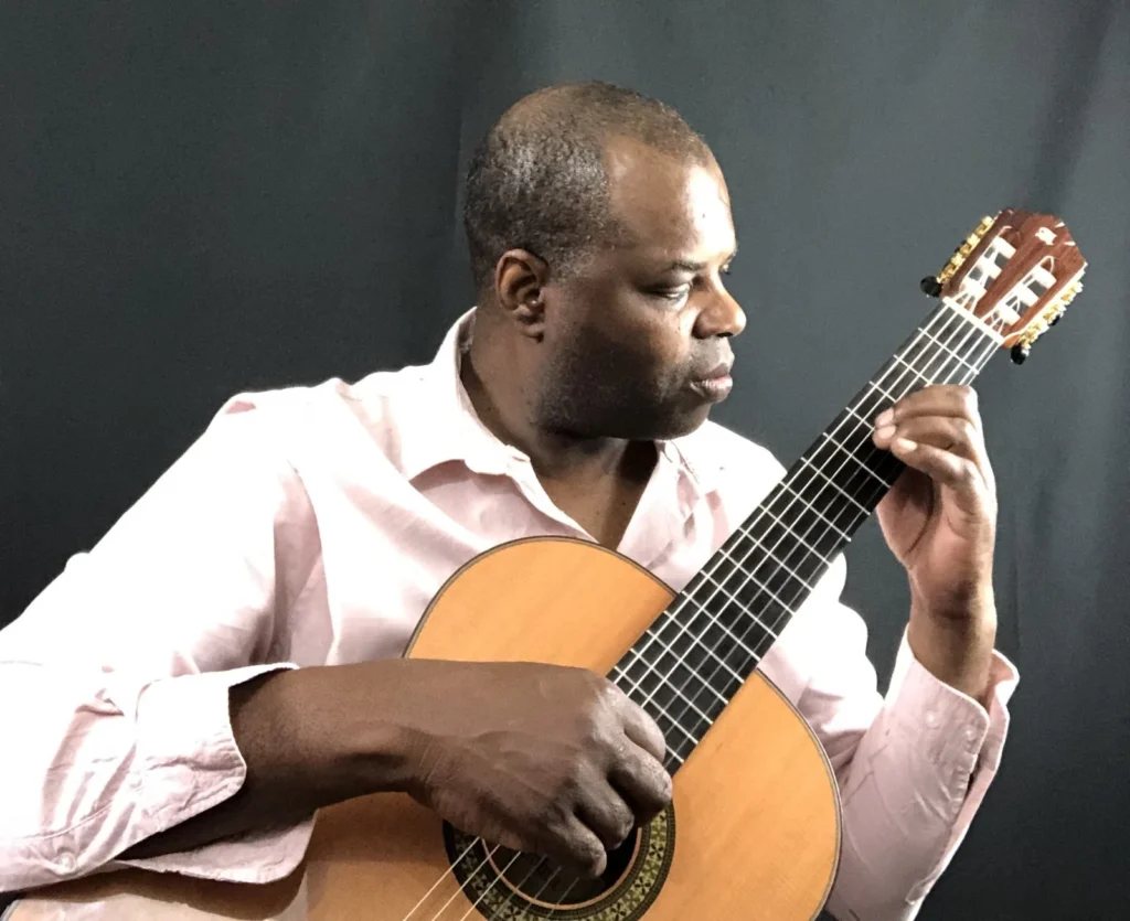 Guitar lessons for beginners learning classical and acoustic guitar