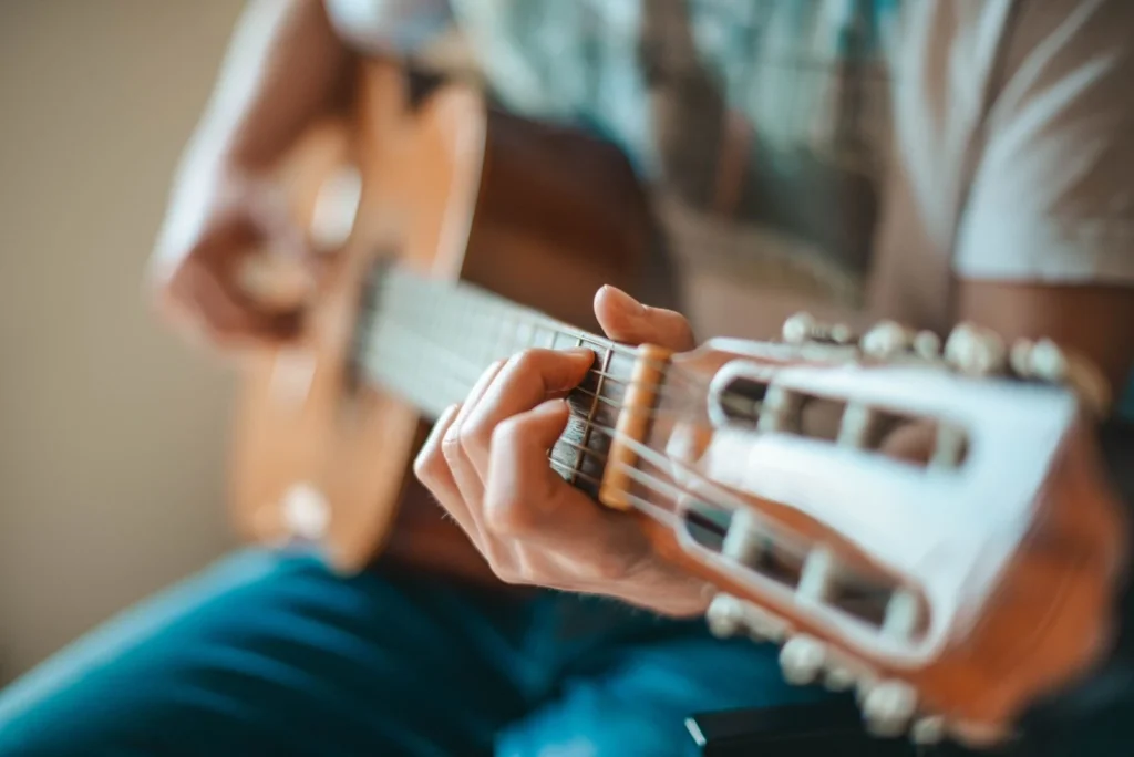 Skilled guitar tutors teaching students of all skill levels