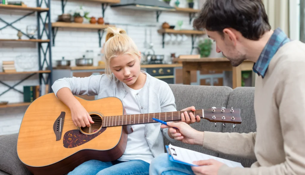 Private guitar lessons for kids with experienced guitar teachers